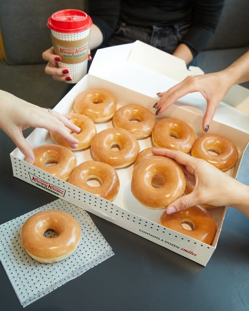 Krispy Kreme dozen glazed donuts in branded box