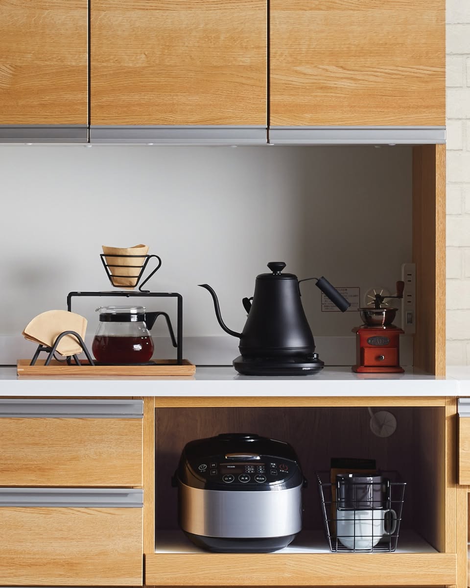 Home cafe corner setup with coffee kettle, grinder, and kitchenware from Nitori Singapore