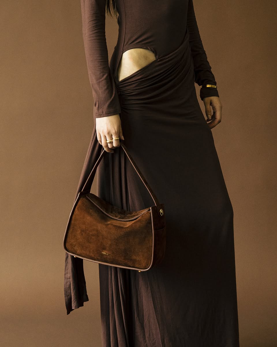 Close-up detail of the velvety suede texture on the Tocco Toscano bag