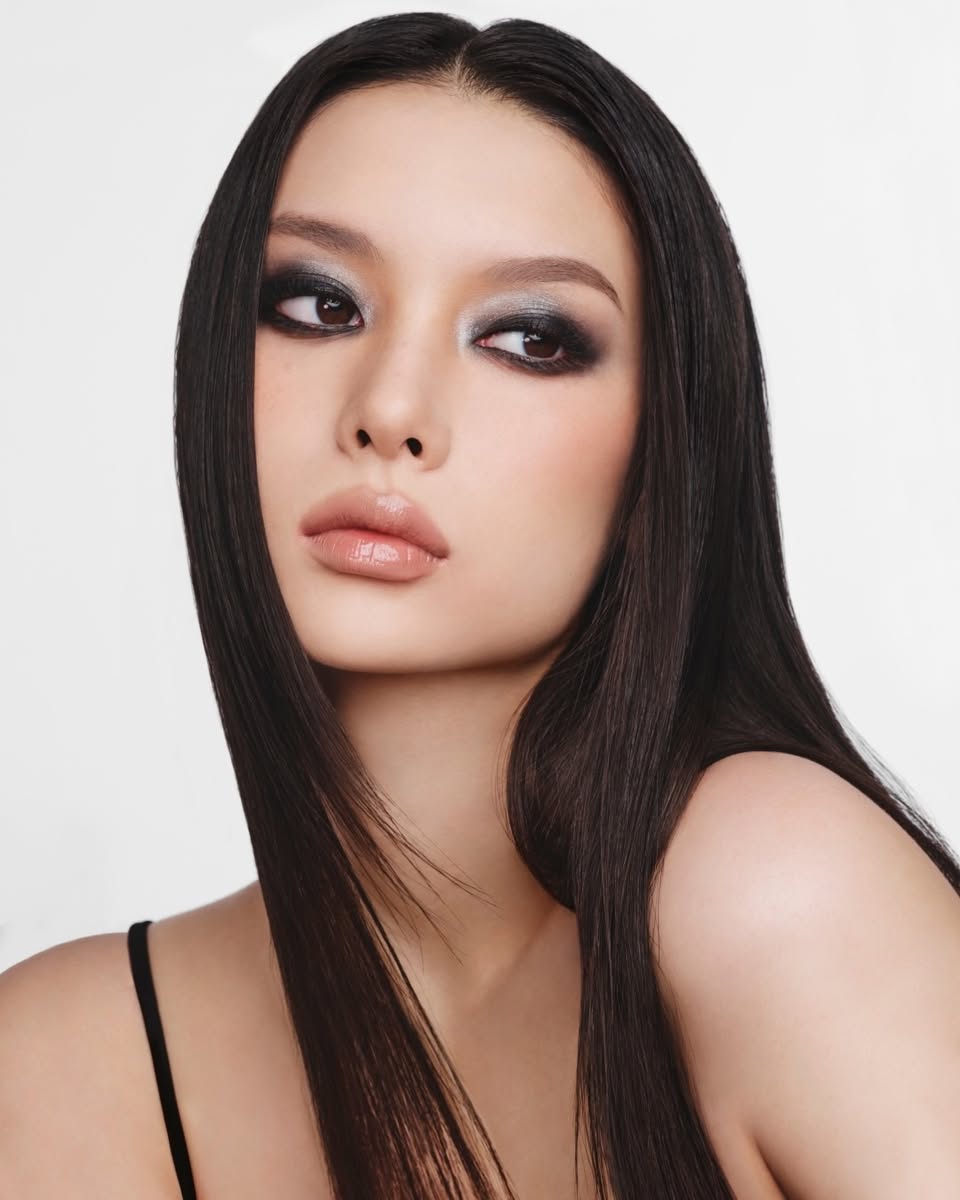 Close-up portrait with dramatic eye makeup