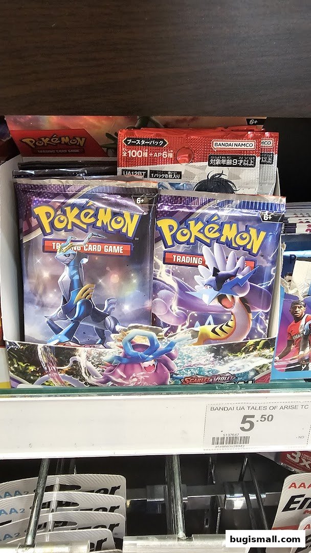 Packs of Pokemon Trading Card Game booster packs are displayed on a shelf.