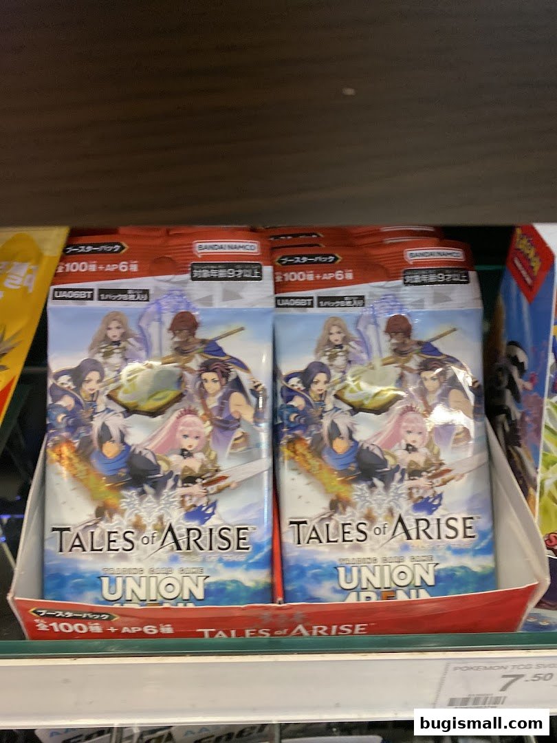 Packs of the 'Tales of Arise' trading card game are displayed on a shelf.