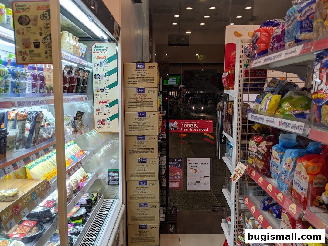 Interior view of a 7-Eleven convenience store with shelves stocked with snacks and drinks.