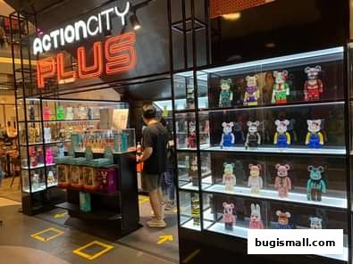 ActionCity PLUS Bugis shop interior with shelves displaying collectible toys and figures.