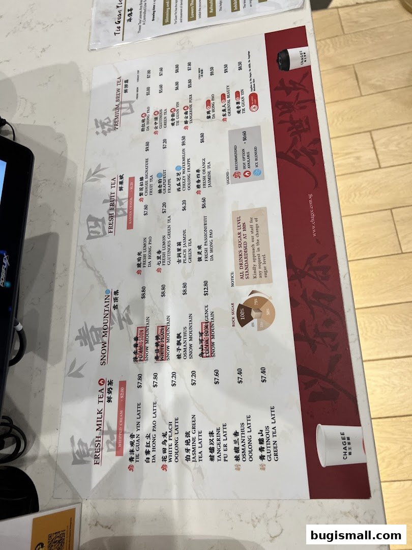 A menu from CHAGEE featuring various milk teas, fruit teas, and premium brew teas with prices.