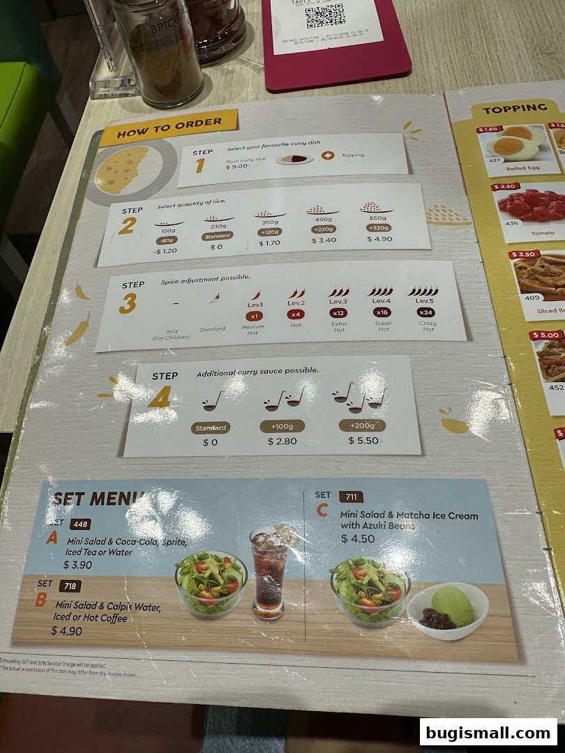 A menu showing how to order curry rice, set menus, and toppings.