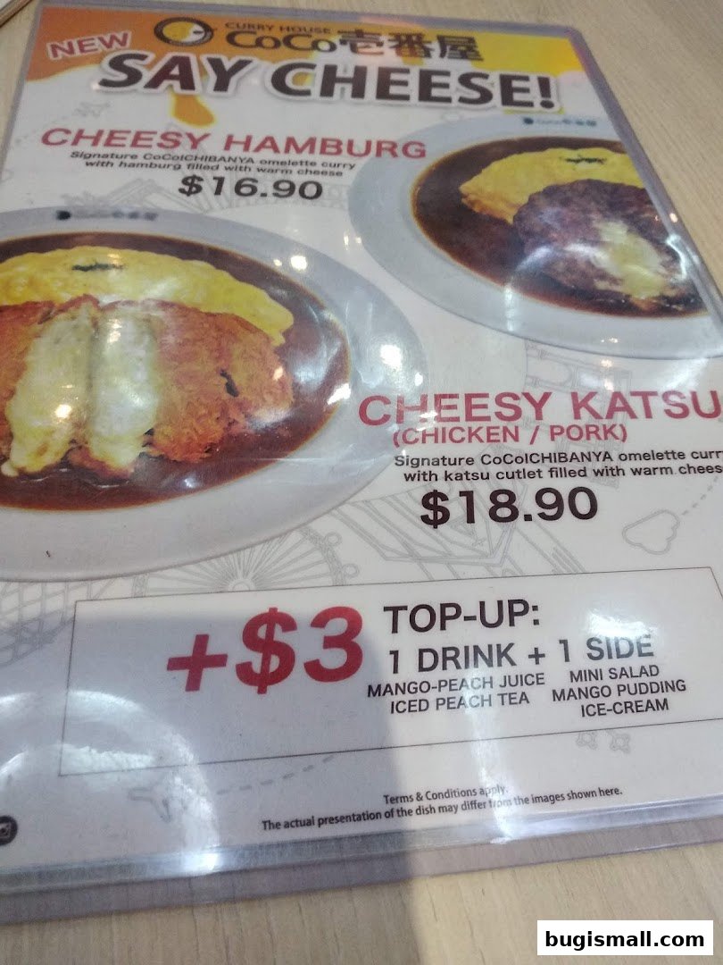 A menu from CoCo Ichibanya featuring cheesy hamburg and cheesy katsu dishes.