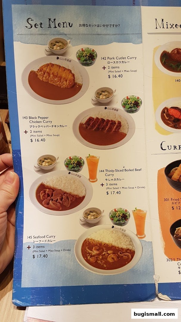 A menu from CoCo Ichibanya featuring various curry sets with side dishes and drinks.