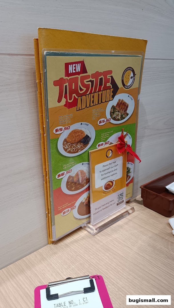 A menu from CoCo Ichibanya featuring new taste adventure curry dishes.