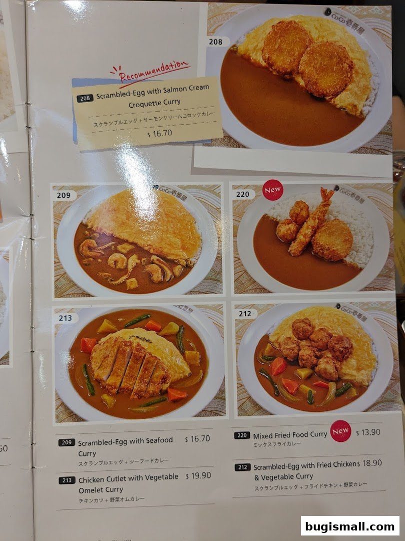 A menu from CoCo Ichibanya featuring various curry dishes with eggs and proteins.