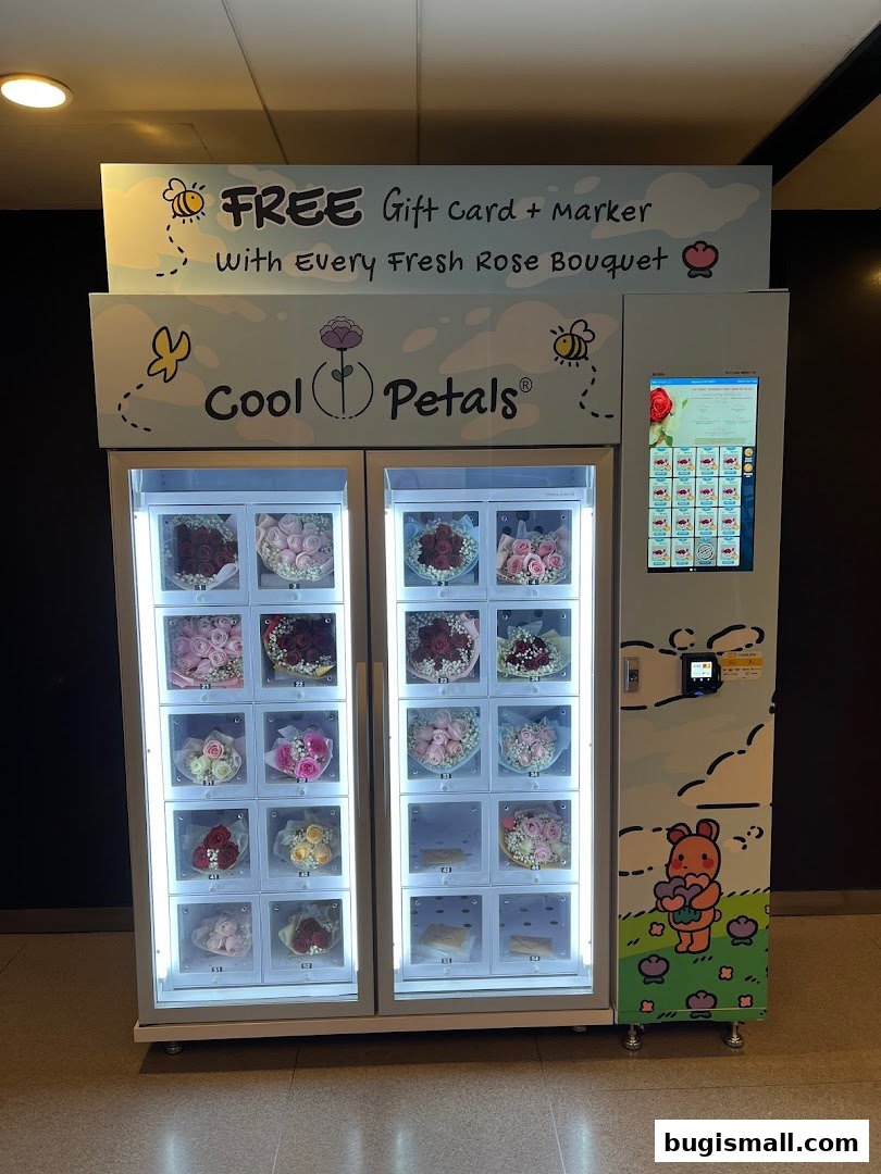 A vending machine filled with fresh rose bouquets, offering a free gift card and marker.