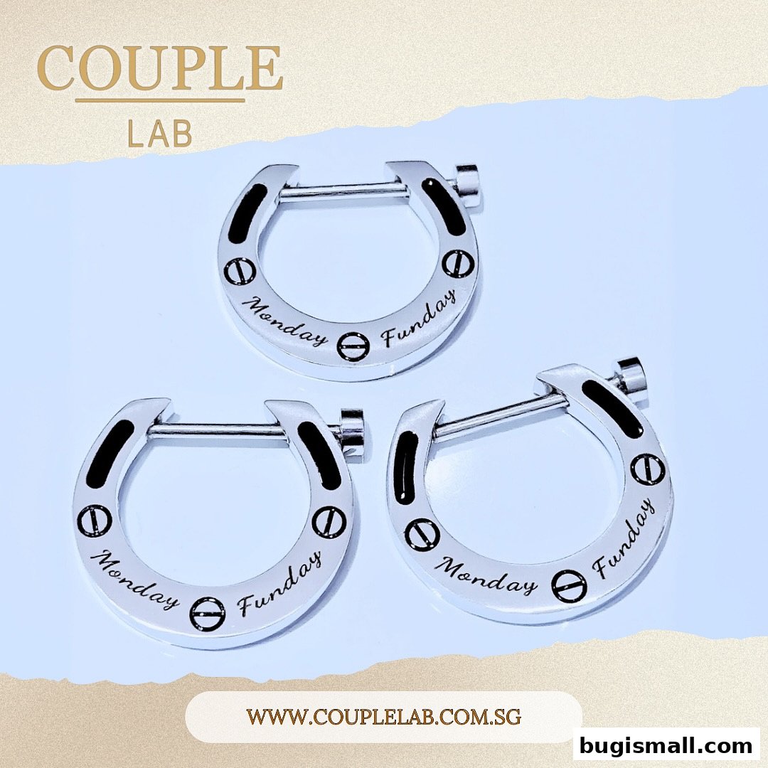 Three silver horseshoe-shaped earrings with 'Monday' and 'Funday' inscribed.