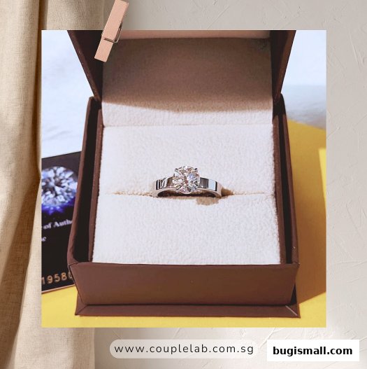 A stunning diamond ring displayed in a brown jewelry box with a certificate of authenticity.