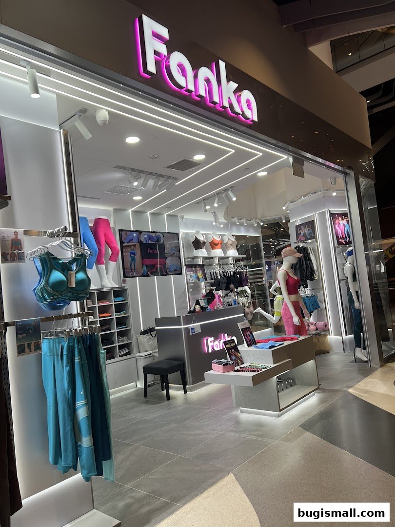 The Fanka Singapore Bugis shop front displays activewear, including bras and leggings, with mannequins and displays.
