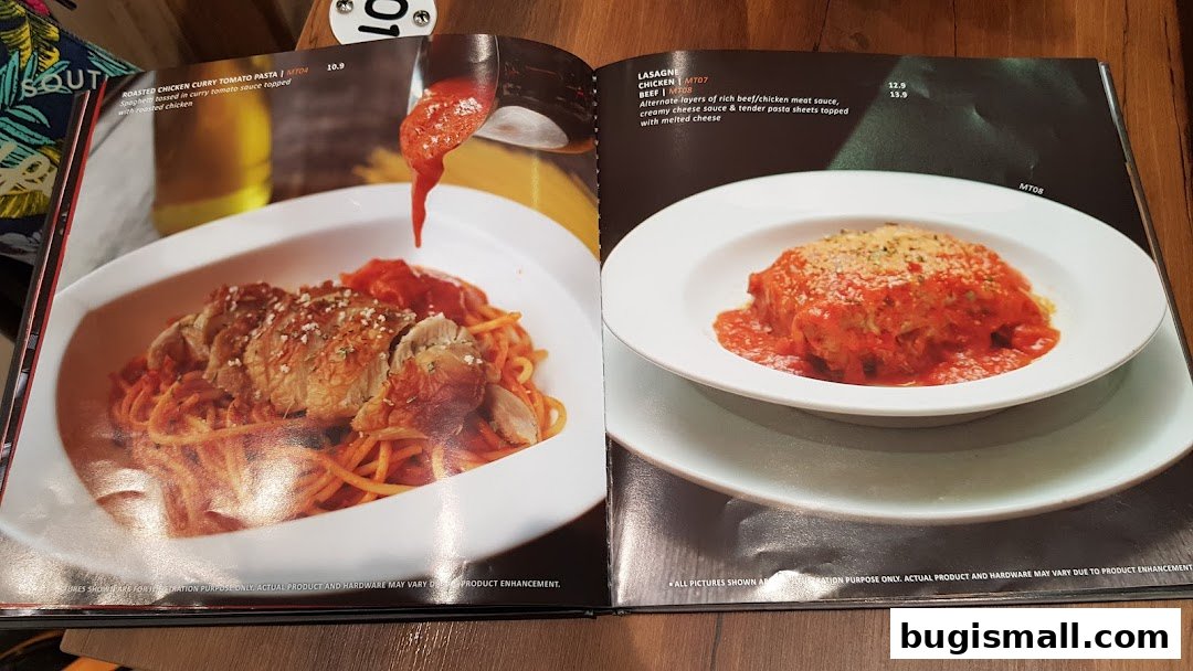 A menu spread featuring two pasta dishes: chicken curry tomato pasta and lasagna.