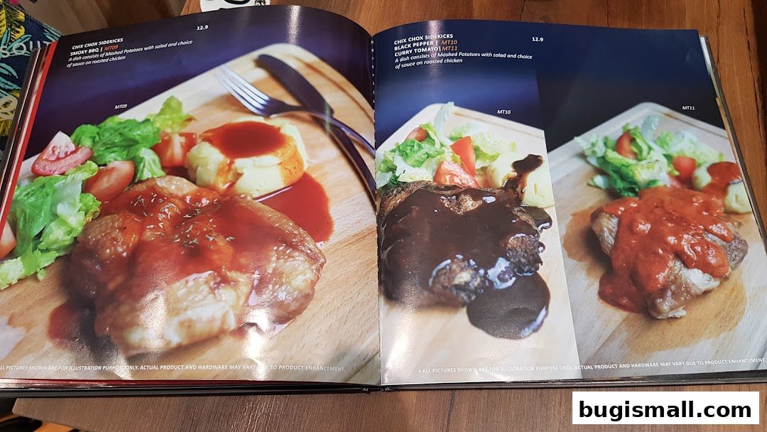 A menu spread showcasing three chicken dishes with mashed potatoes and salad.