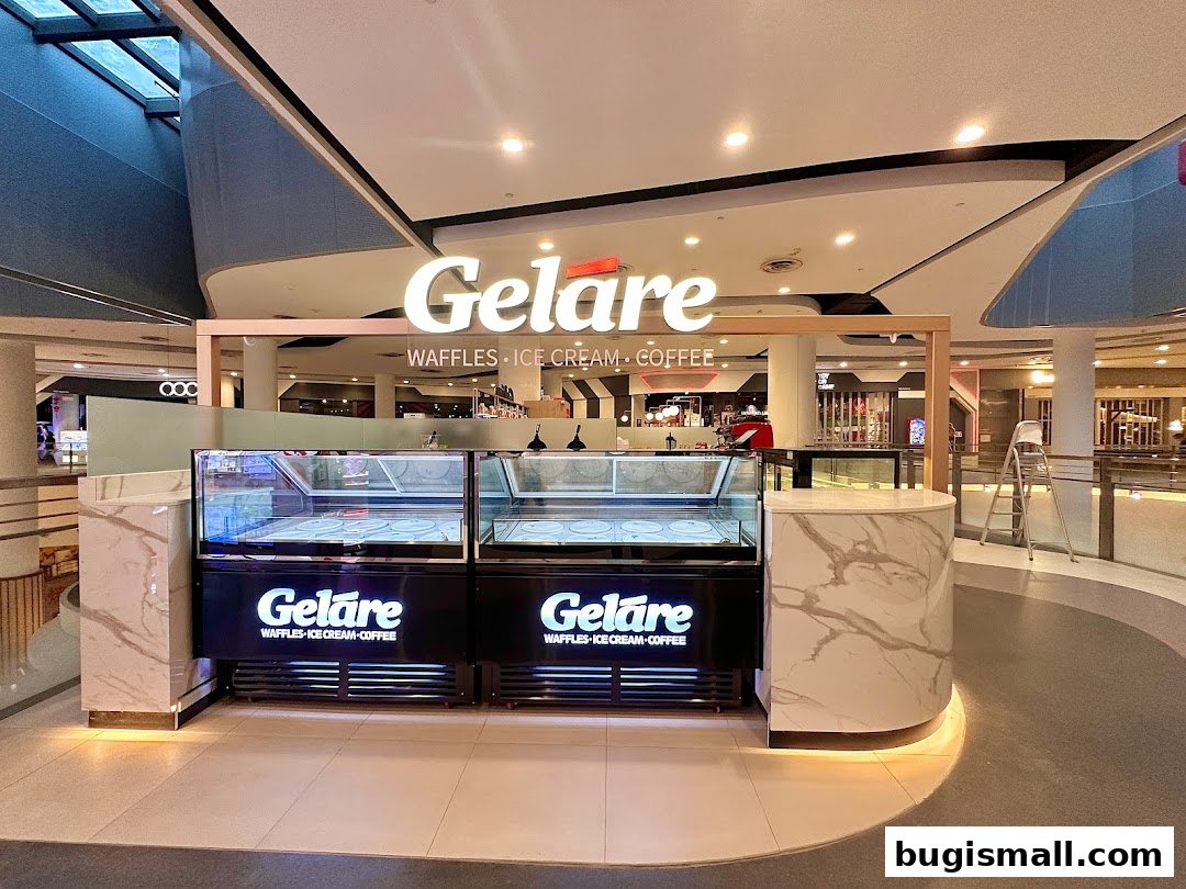 The Geláre shop front with its illuminated sign and display freezers.