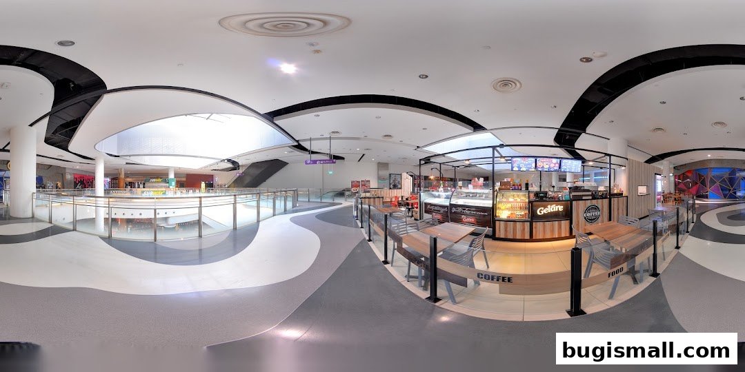 A Geláre ice cream and coffee shop with seating area in a modern shopping mall.
