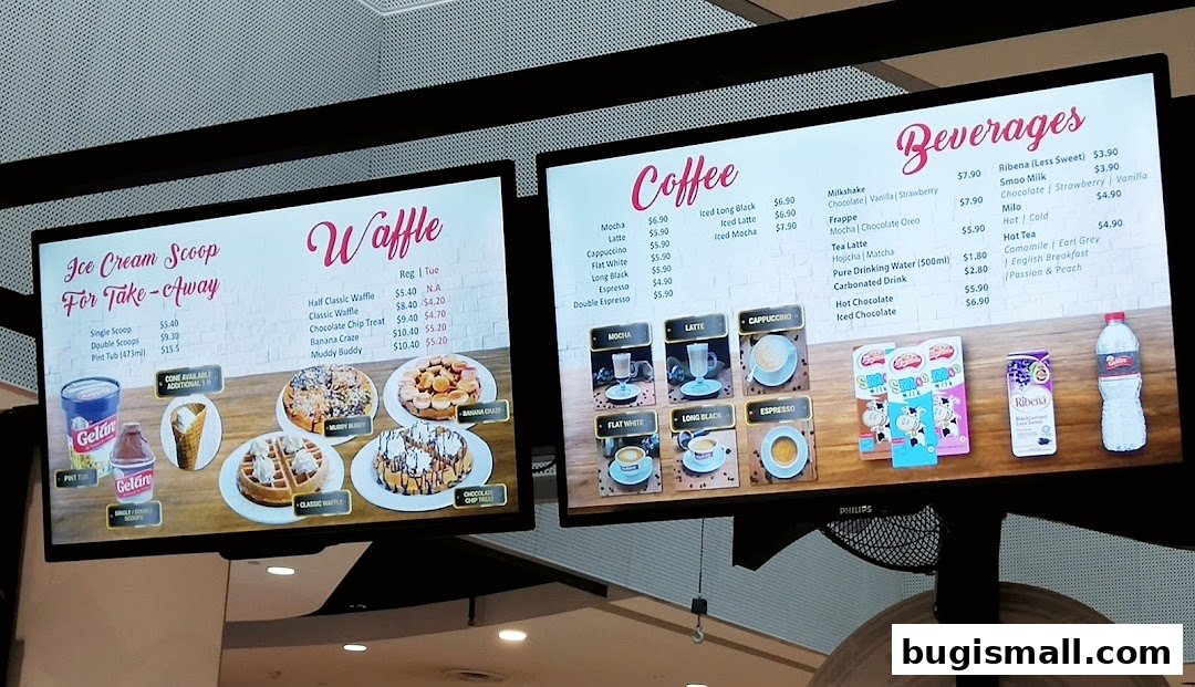 Digital menu boards displaying ice cream, waffles, coffee, and beverages at Geláre.