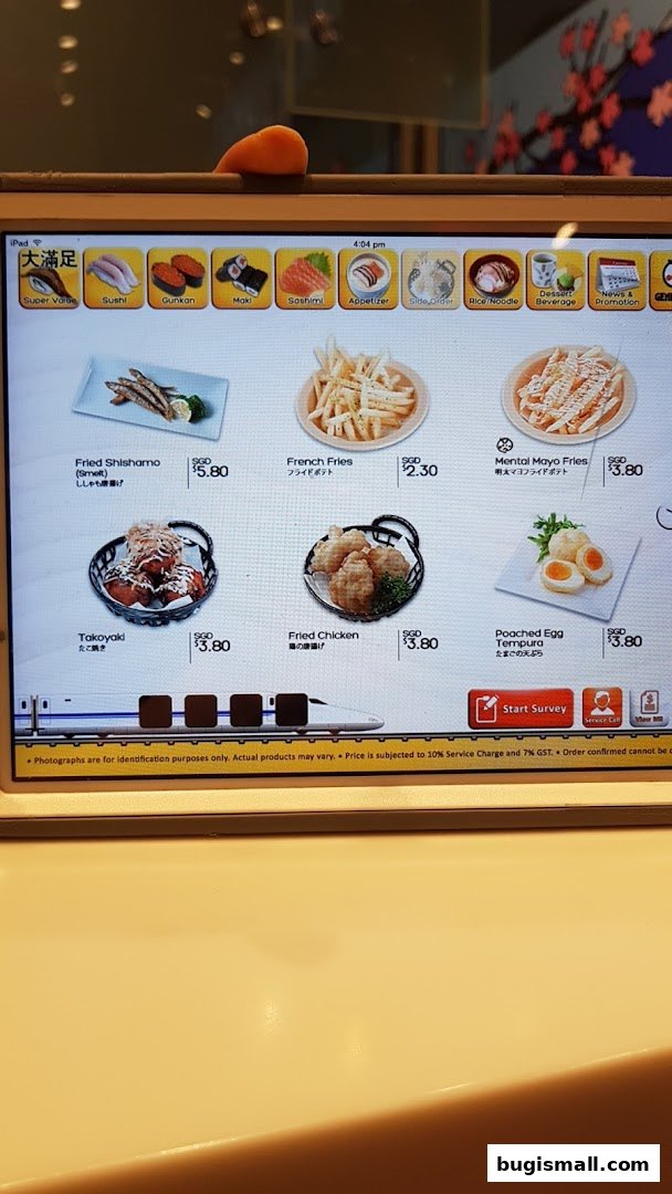 A tablet displaying a Japanese restaurant menu with various food items and prices.