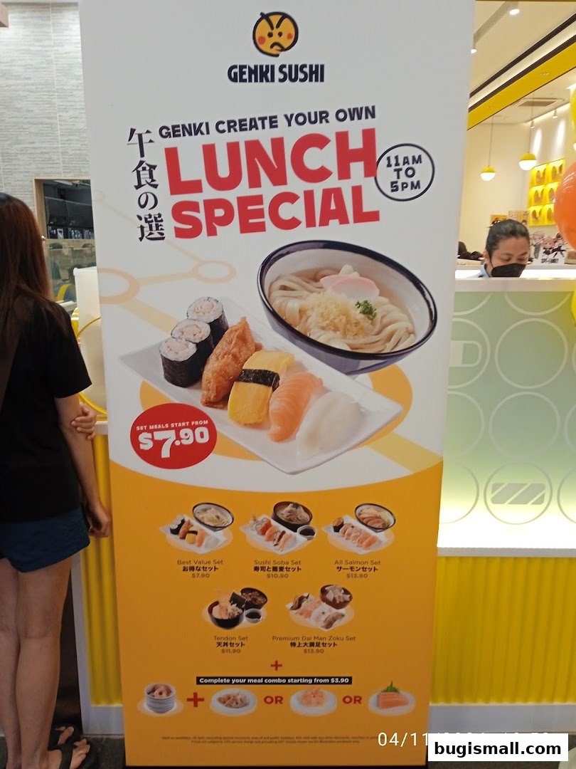 A banner advertising Genki Sushi's lunch special with various sushi and udon meal sets.