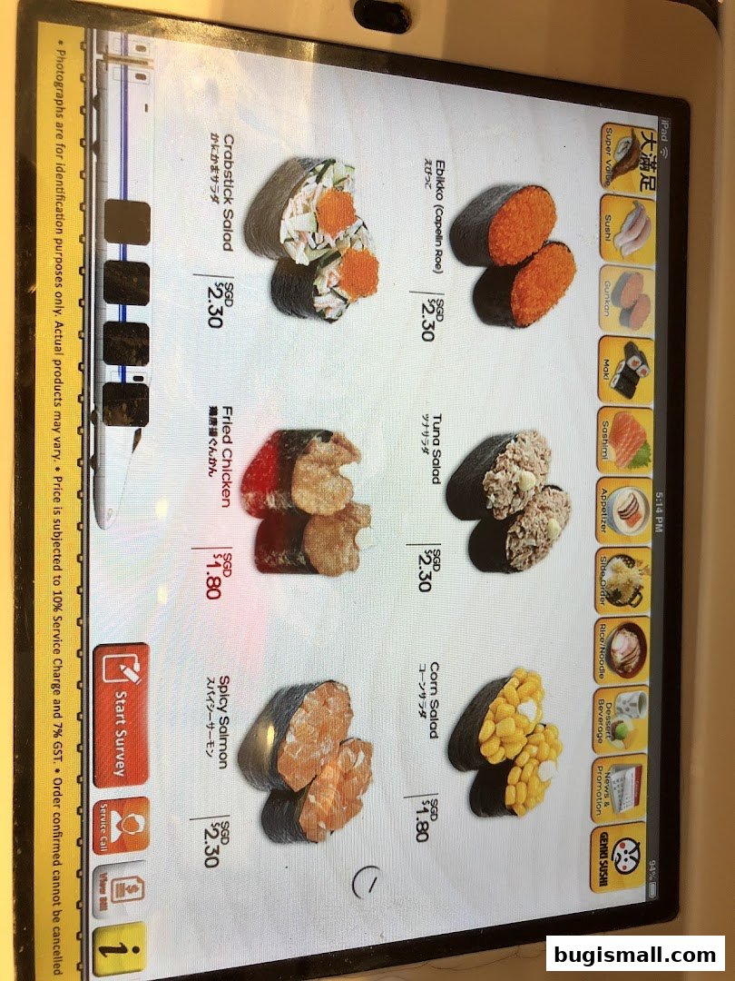 A tablet screen displaying a menu of various sushi items with prices.
