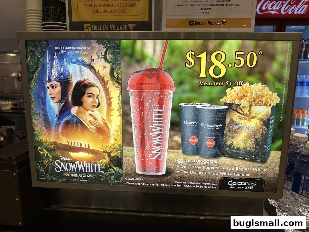 A movie poster and combo deal for Disney's Snow White at Golden Village.