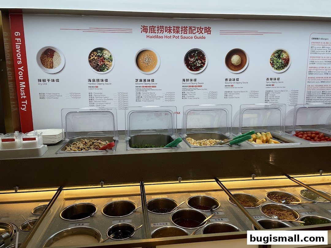 A display of ingredients and sauces for making hot pot dipping sauces at Haidilao.