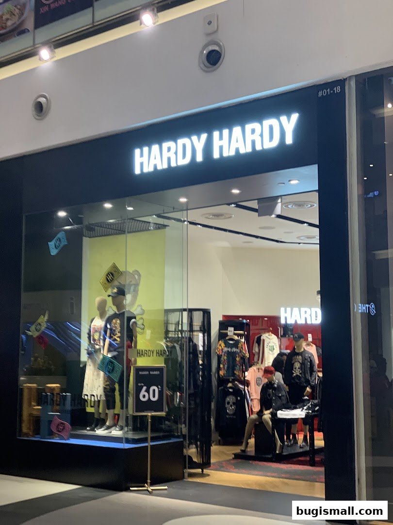 The Hardy Hardy store front displays mannequins and clothing inside, with a sale sign visible.