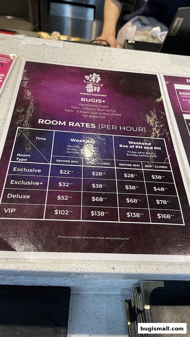 A menu displaying room rates per hour for HaveFun Karaoke Bugis+ with different room types and time slots.