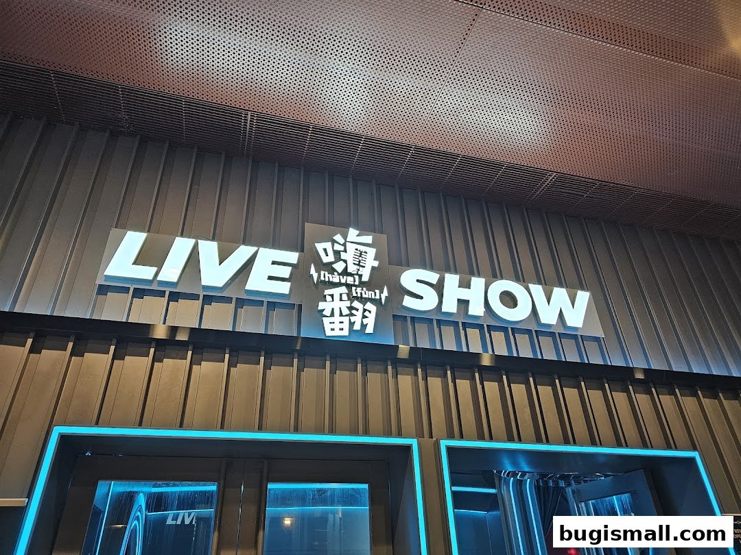 The illuminated sign for 'HaveFun Live Show' is displayed above the shop entrance.