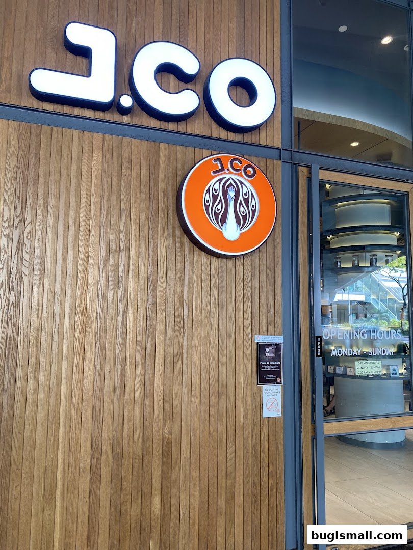 The exterior of a J.CO Donuts & Coffee shop with its prominent signage.