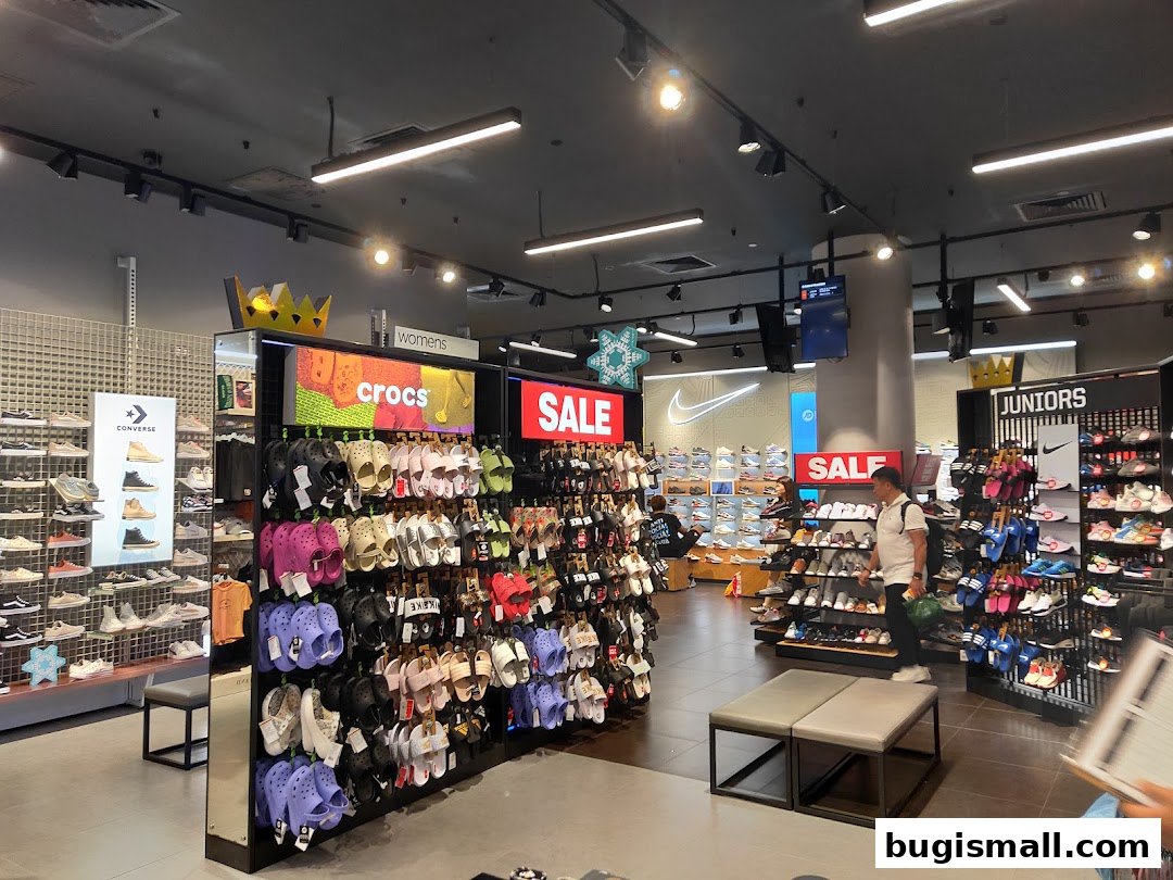 Interior view of JD Sports store showcasing a wide selection of footwear and apparel.