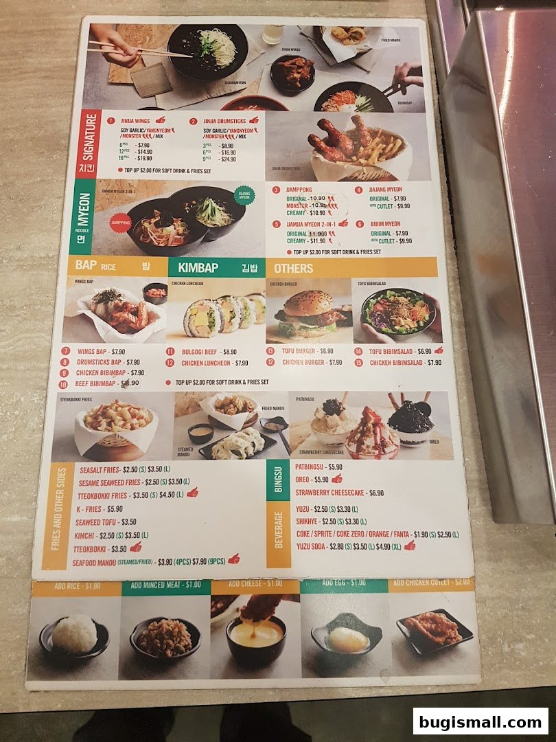 A menu from JINJJA Chicken featuring Korean fried chicken, noodles, rice dishes, and desserts.