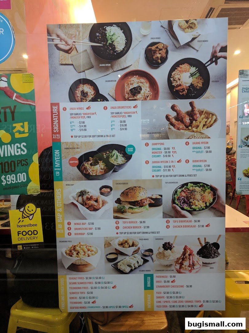 A menu board displaying various Korean fried chicken dishes, noodles, burgers, and bingsu.