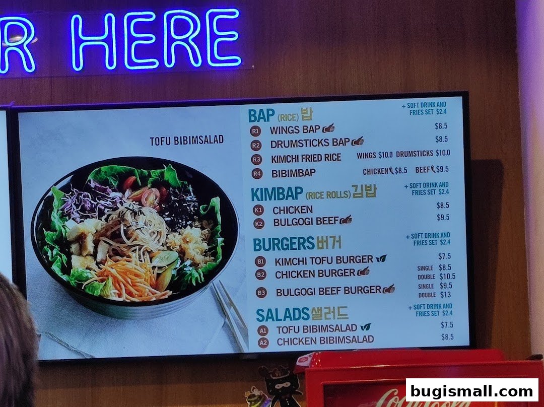 A digital menu board displays Korean dishes including Bap, Kimbap, Burgers, and Salads.