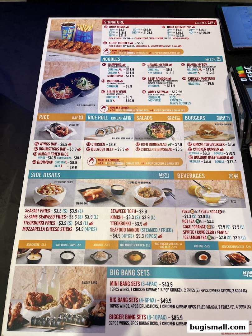 A menu for JINJJA Chicken featuring signature dishes, noodles, rice, sides, beverages, and set meals.