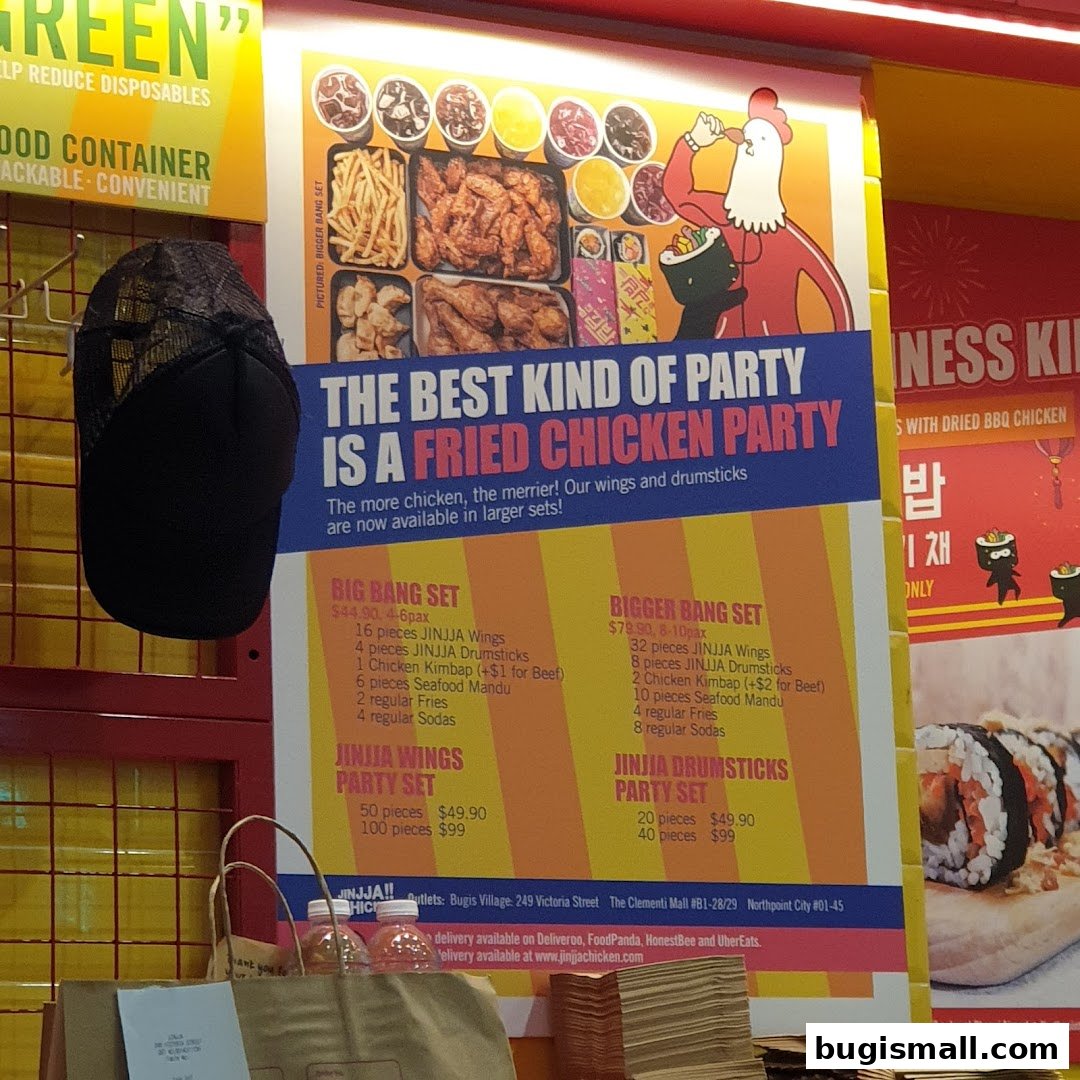 A promotional poster for JINJJA Chicken featuring various fried chicken sets and menu items.