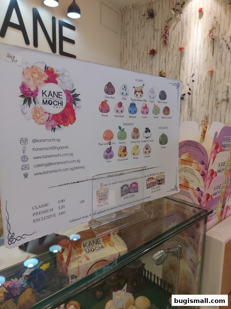A menu board for Kane Mochi, showcasing various mochi flavors and prices.