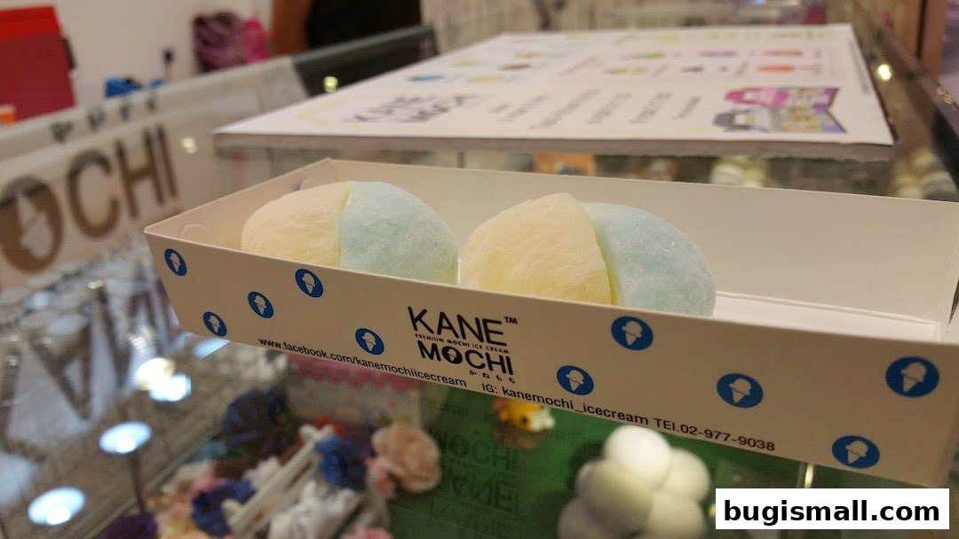 A box of colorful mochi ice cream from Kane Mochi, with branding visible.