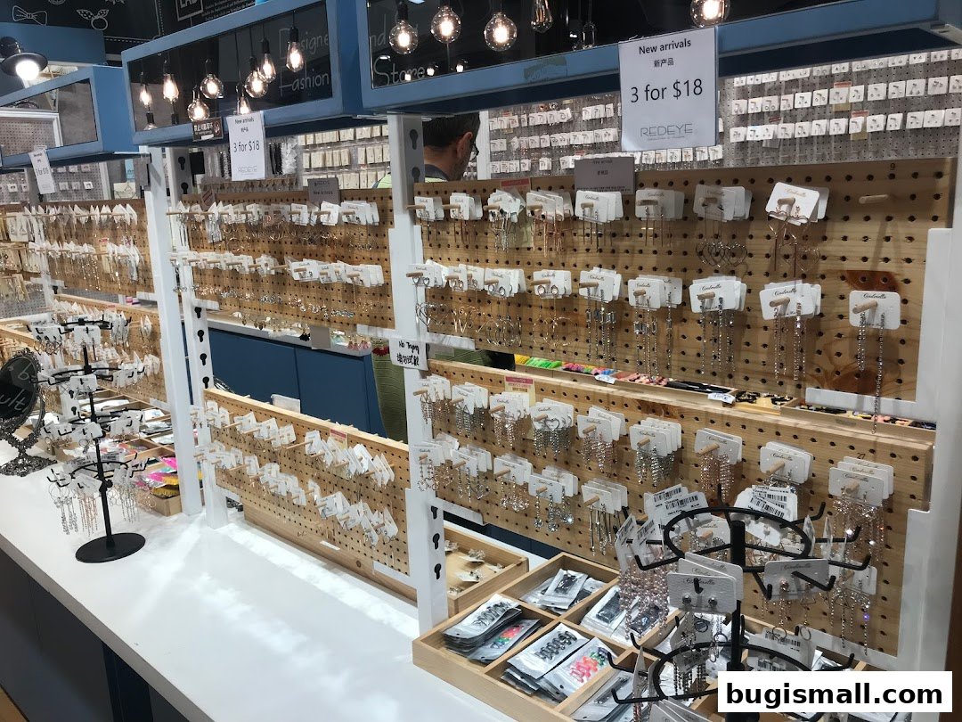 A shop interior displaying a wide variety of earrings and accessories on pegboards.