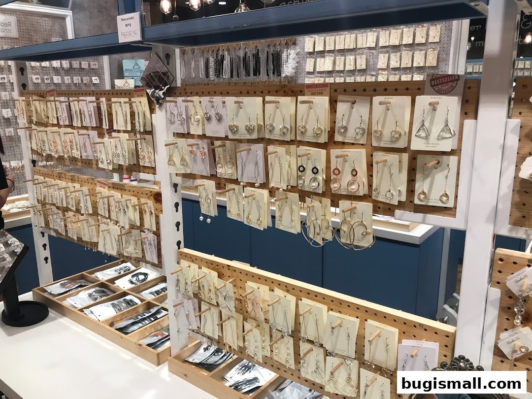 A display of various earrings and jewelry items at a retail shop.