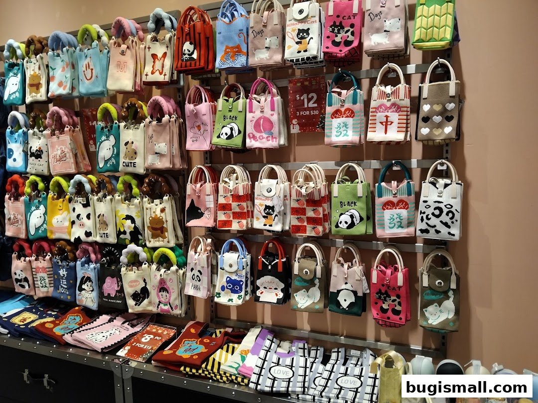 A wall display filled with various small, colorful tote bags featuring cute animal and graphic designs.
