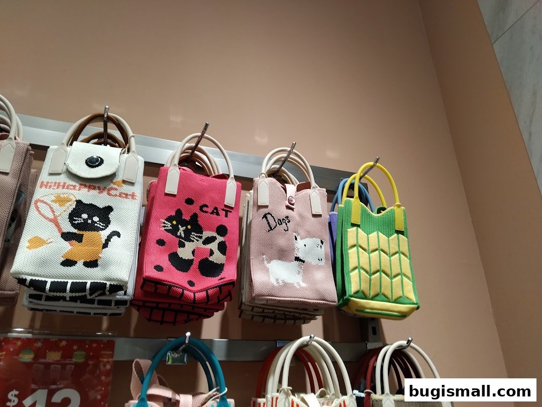 A display of colorful tote bags with animal prints and unique designs.