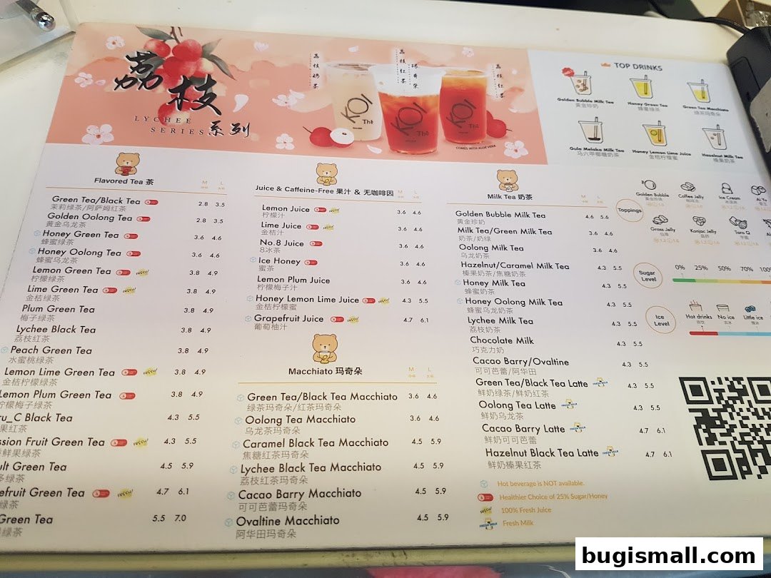 A menu for KOI Thé featuring various milk teas, fruit teas, and macchiatos with prices.