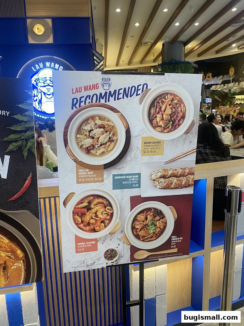 A display board showcasing recommended claypot dishes from Lau Wang Claypot Delights.