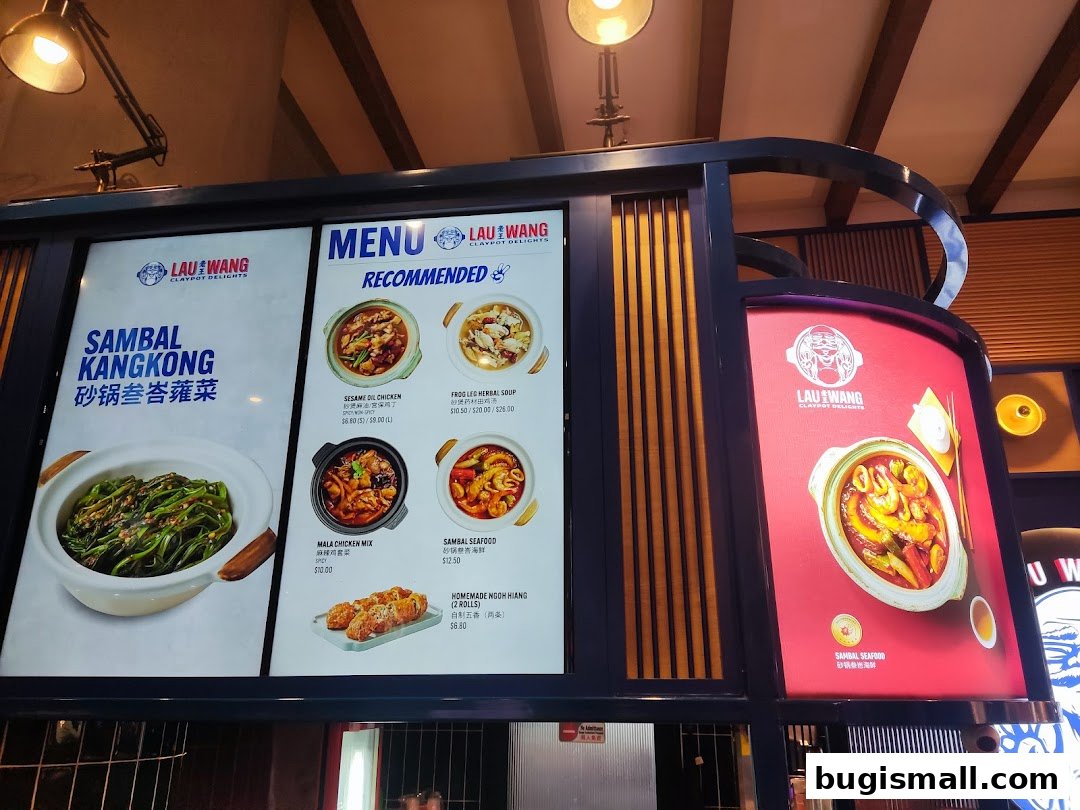 A menu board displaying various claypot dishes and recommended items from Lau Wang Claypot Delights.