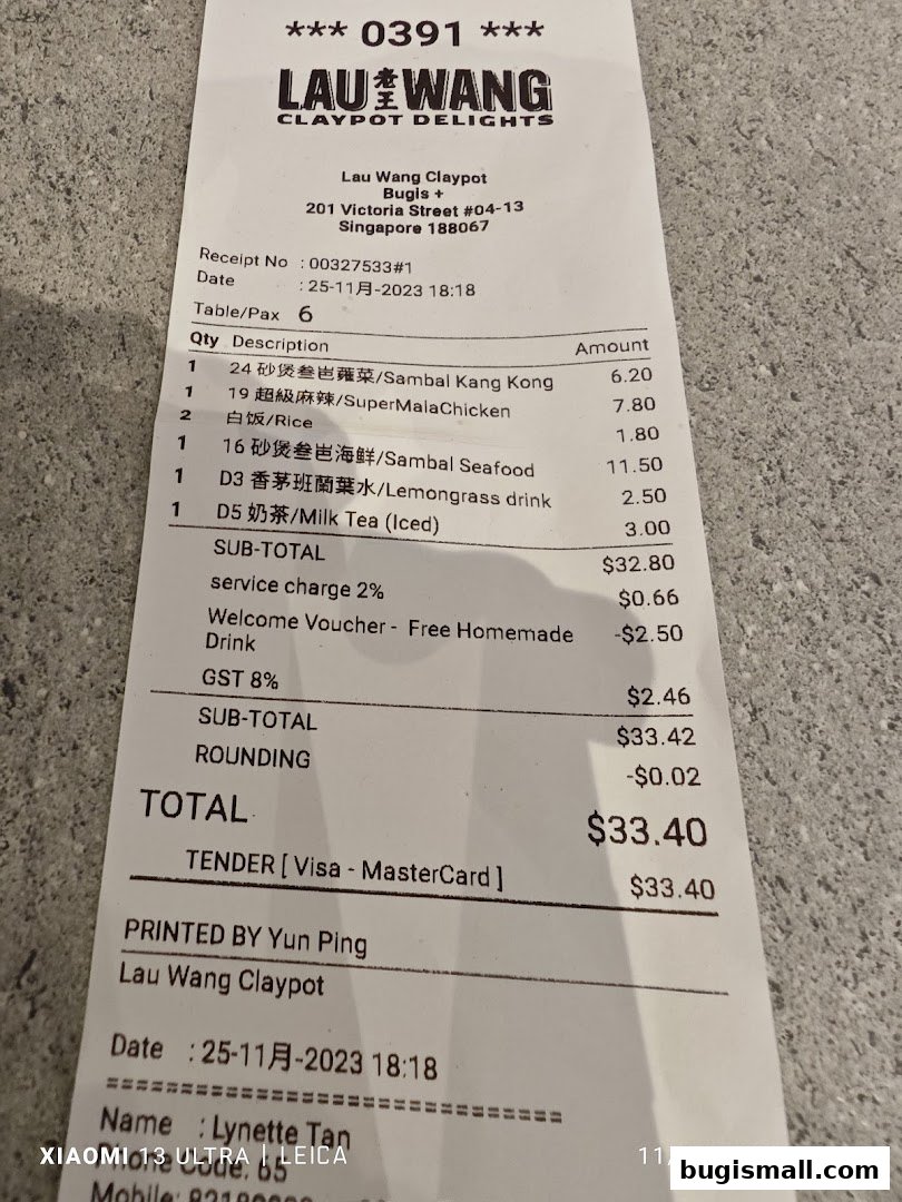 A receipt from Lau Wang Claypot Delights showing a list of ordered dishes and their prices.