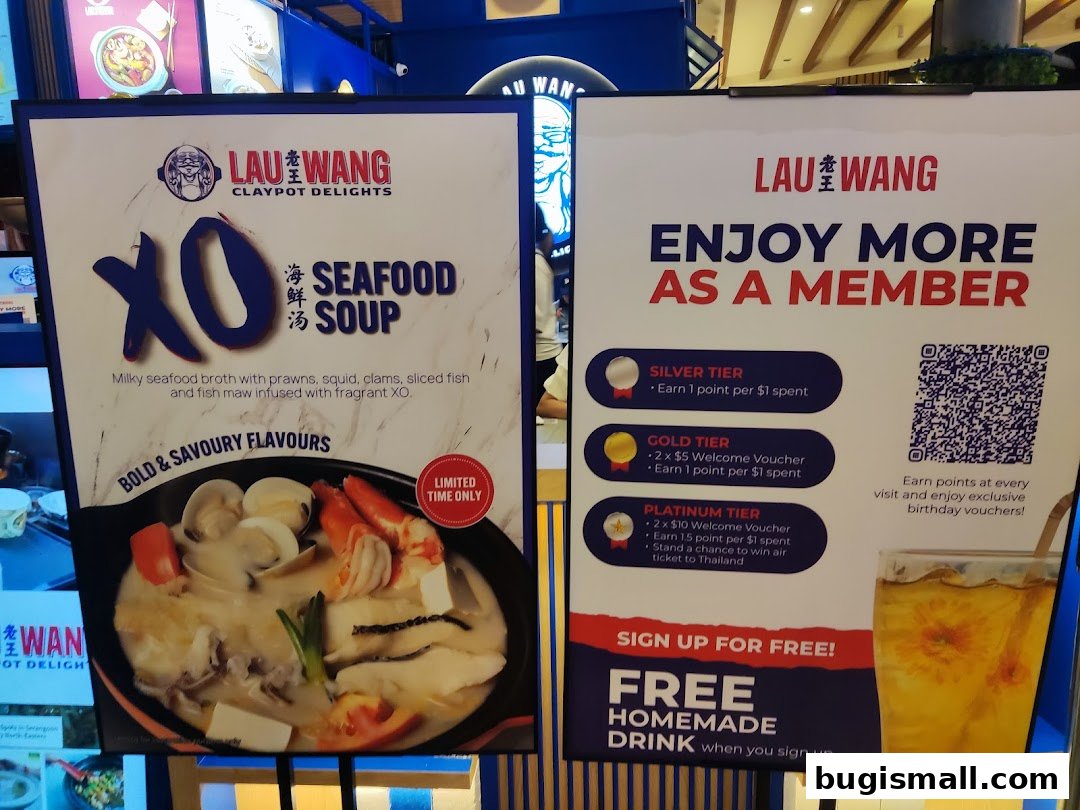 Promotional posters for Lau Wang Claypot Delights, featuring XO Seafood Soup and a membership program.