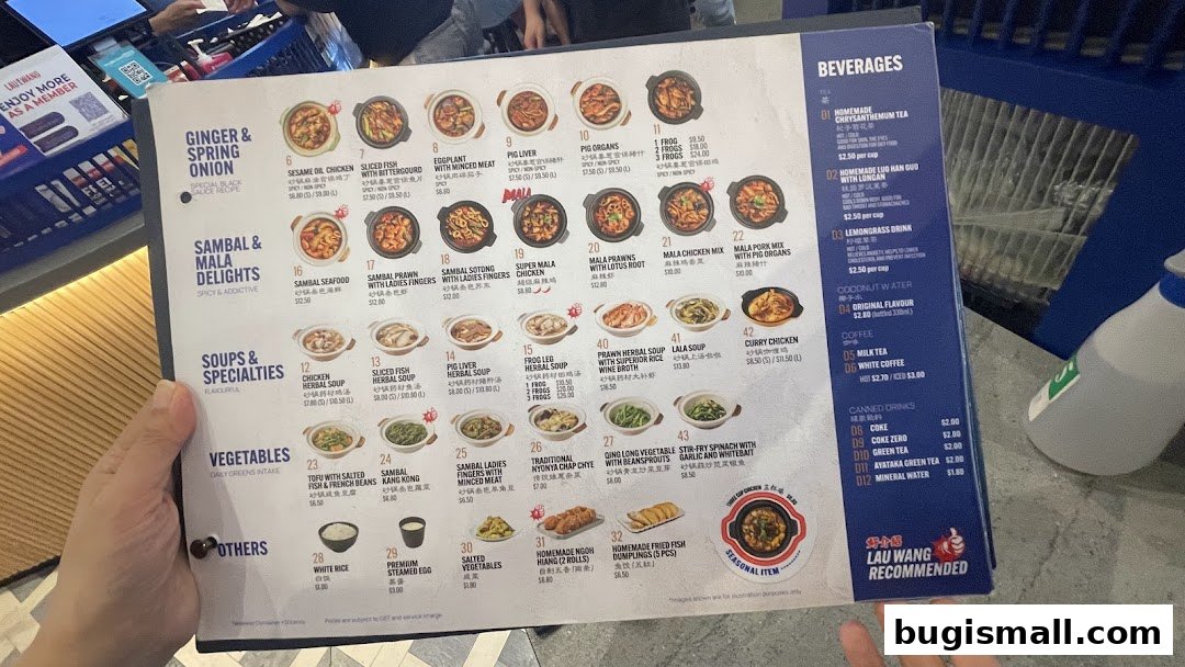 A person holding a menu from Lau Wang Claypot Delights, showcasing various dishes and beverages.